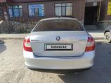 Skoda Rapid 2013 года за 3 700 000 тг. в Актобе – фото 2