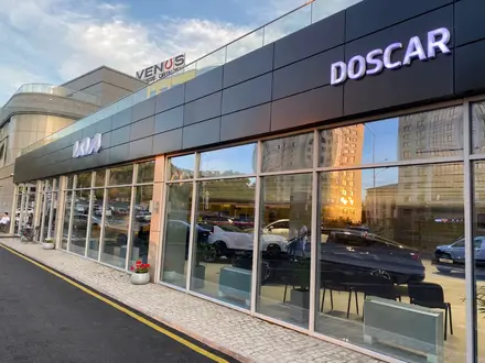 DOSCAR Almaty — официальный дилер Kia в Алматы