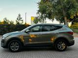 Hyundai Santa Fe 2015 года за 5 700 000 тг. в Уральск – фото 2