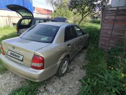 Mazda 323 1999 года за 1 300 000 тг. в Алматы – фото 2