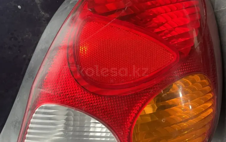 Задний фанар Тайота Corolla за 100 тг. в Алматы