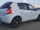 Renault Sandero 2013 года за 2 700 000 тг. в Уральск – фото 4