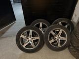 Зимняя резина 235/55 R17 с дисками за 230 000 тг. в Караганда