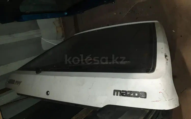 Крышка багажника на Mazda 323 за 15 000 тг. в Алматы