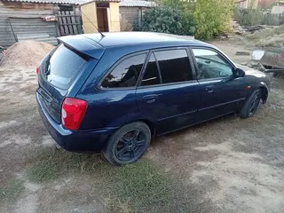Mazda Familia, 2002