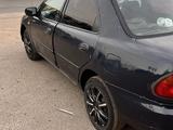 Mazda 323 1996 года за 550 000 тг. в Отеген-Батыр – фото 3