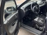 Mazda 323 1996 года за 550 000 тг. в Отеген-Батыр – фото 2