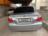 Mitsubishi Lancer 2006 года за 1 700 000 тг. в Шамалган – фото 4