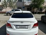 Hyundai Solaris 2012 года за 2 200 000 тг. в Атырау – фото 2