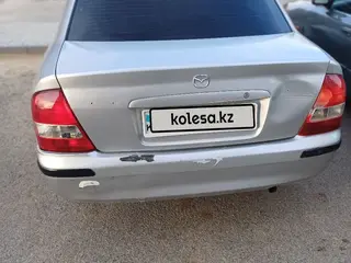 Mazda 323, 1998