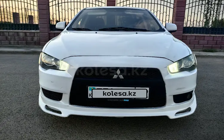 Mitsubishi Lancer 2009 годаfor4 200 000 тг. в Жанаозен