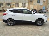 Hyundai Tucson 2014 годаүшін8 800 000 тг. в Актау – фото 4