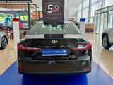 Toyota Camry Luxe eCVT 2026 года за 26 190 000 тг. в Экибастуз – фото 4