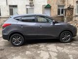 Hyundai Tucson 2013 годаүшін8 600 000 тг. в Караганда – фото 4