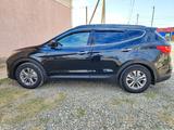 Hyundai Santa Fe 2015 года за 10 000 000 тг. в Уральск – фото 2