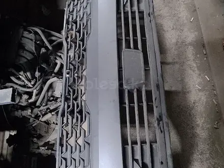 KIA K5 передний бампер за 2 121 тг. в Шымкент