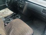 Toyota Carina E 1995 года за 600 000 тг. в Алматы – фото 5
