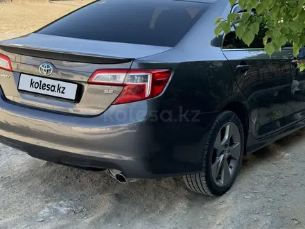 Toyota Camry 2013 года за 7 555 555 тг. в Жанаозен