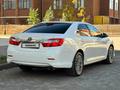 Toyota Camry 2012 года за 7 500 000 тг. в Актобе – фото 2
