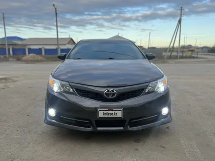 Toyota Camry 2014 года за 6 500 000 тг. в Атырау