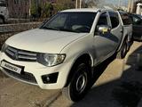 Mitsubishi L200 2011 года за 6 000 000 тг. в Шымкент – фото 2