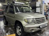 Mitsubishi Pajero iO 2002 годаfor3 500 000 тг. в Астана – фото 2
