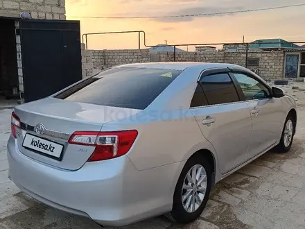 Toyota Camry 2012 года за 7 900 000 тг. в Жанаозен