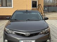 Toyota Camry 2014 года за 8 700 000 тг. в Атырау