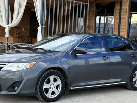 Toyota Camry 2012 года за 7 400 000 тг. в Атырау