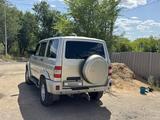 УАЗ Patriot 2014 года за 3 000 000 тг. в Караганда – фото 2