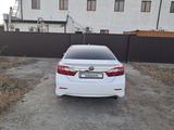 Toyota Camry 2014 годаүшін9 500 000 тг. в Атырау – фото 2