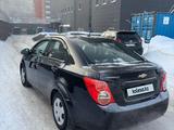 Chevrolet Aveo 2014 года за 3 500 000 тг. в Караганда – фото 4