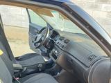 Skoda Fabia 2011 года за 2 550 000 тг. в Актау – фото 3