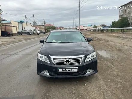 Toyota Camry 2014 года за 9 500 000 тг. в Атырау