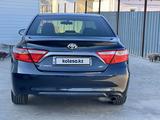 Toyota Camry 2015 годаүшін10 200 000 тг. в Атырау – фото 4