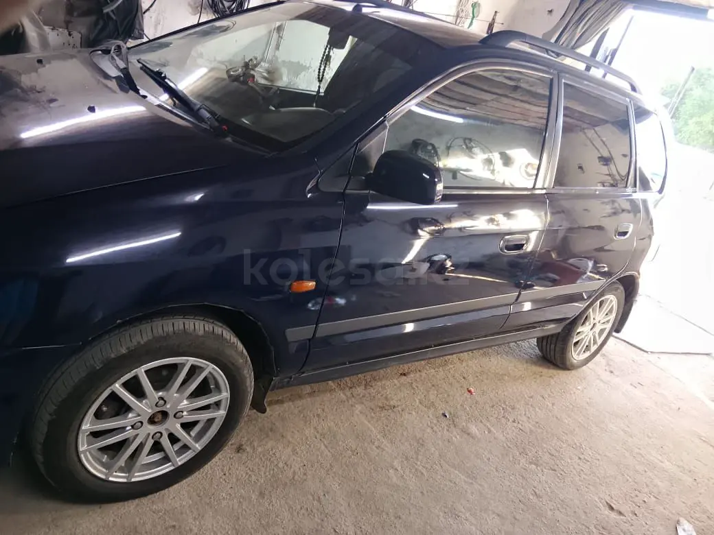 Mitsubishi Space Star, 1999