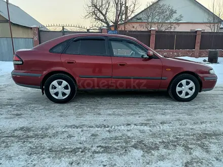 Mazda 626 1997 года за 2 100 000 тг. в Алматы – фото 4