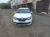 Renault Logan 2014 года за 2 900 000 тг. в Актобе – фото 2