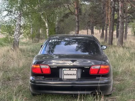 Mazda Eunos 800 1997 года за 1 000 000 тг. в Аксу – фото 4