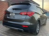 Hyundai Santa Fe 2013 года за 4 500 000 тг. в Актобе – фото 4