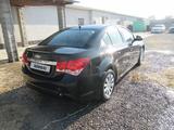 Chevrolet Cruze 2011 годаүшін2 330 250 тг. в Шымкент – фото 4