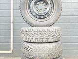 Зимнюю резину Cordiant 185/65 R14 с шипами + диски за 80 000 тг. в Караганда