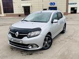 Renault Logan 2015 года за 4 100 000 тг. в Караганда – фото 2