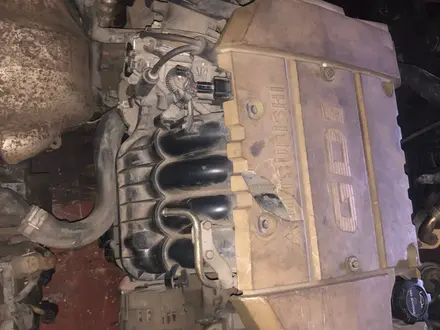 Двигатель акпп в сборе 1.8 GDI за 1 000 тг. в Алматы – фото 2