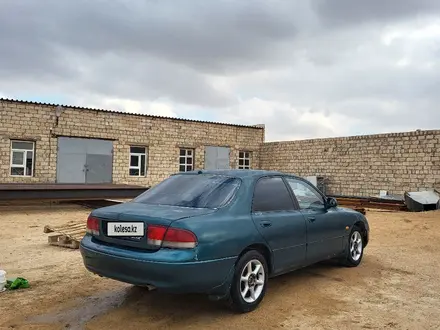 Mazda 626 1992 года за 900 000 тг. в Жанаозен – фото 3