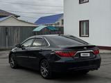 Toyota Camry 2015 года за 6 800 000 тг. в Атырау – фото 4