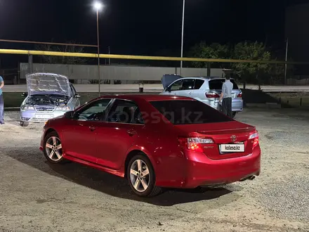 Toyota Camry 2012 года за 8 300 000 тг. в Актобе