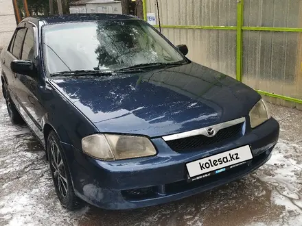 Mazda 323 2000 года за 1 300 000 тг. в Алматы – фото 10