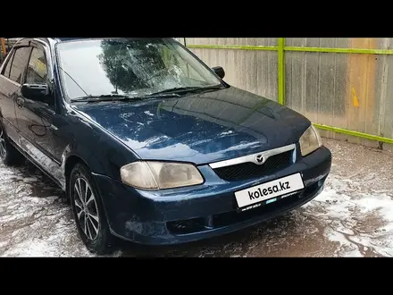 Mazda 323 2000 года за 1 300 000 тг. в Алматы – фото 12