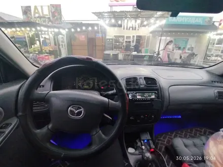 Mazda 323 2000 года за 1 300 000 тг. в Алматы – фото 13